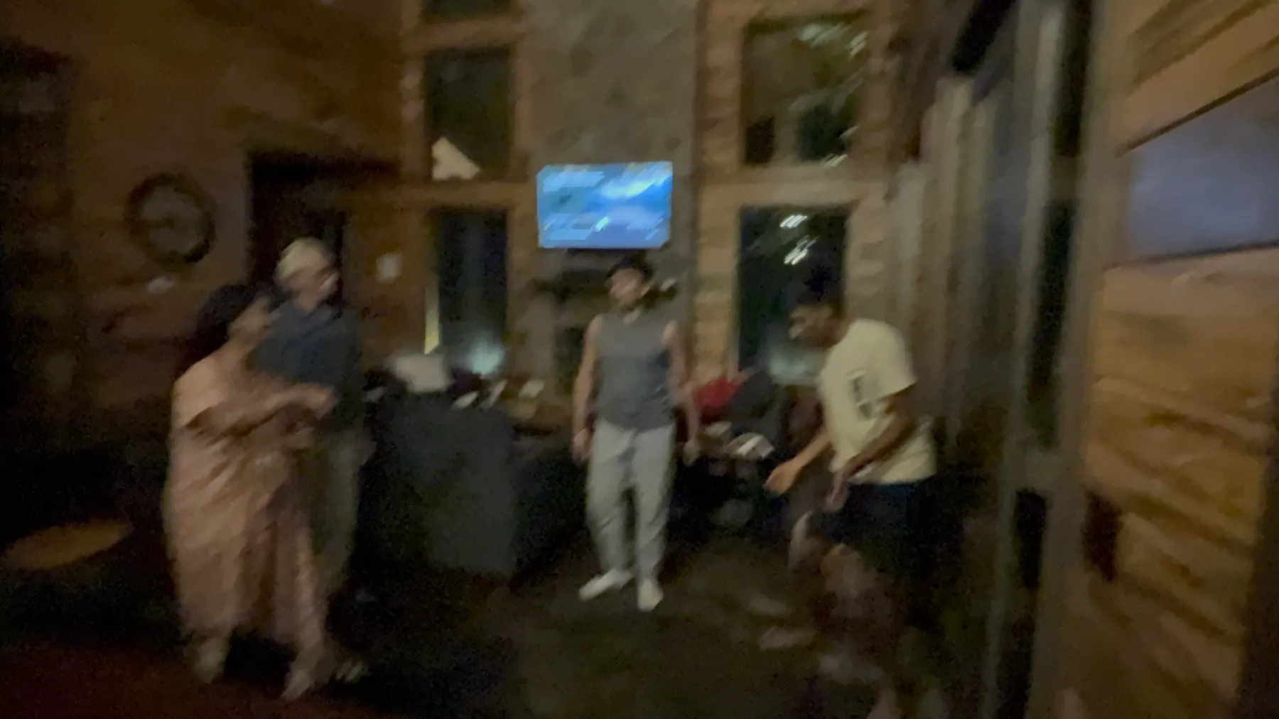 A photo of people dancing. The camera was not the blurry part.
